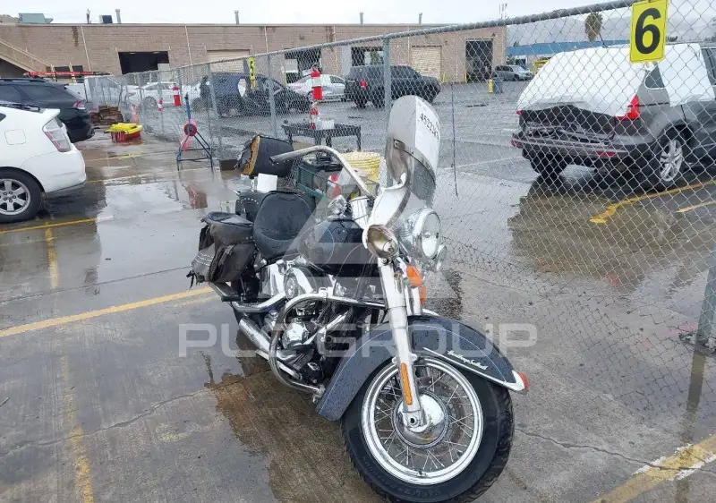 2014 Harley-Davidson FLSTC фото
