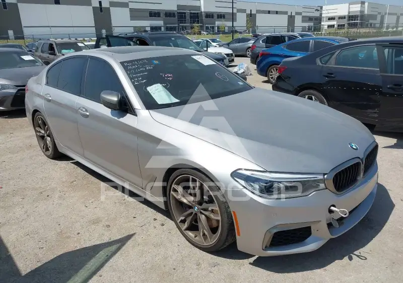 2020 BMW 550M фото