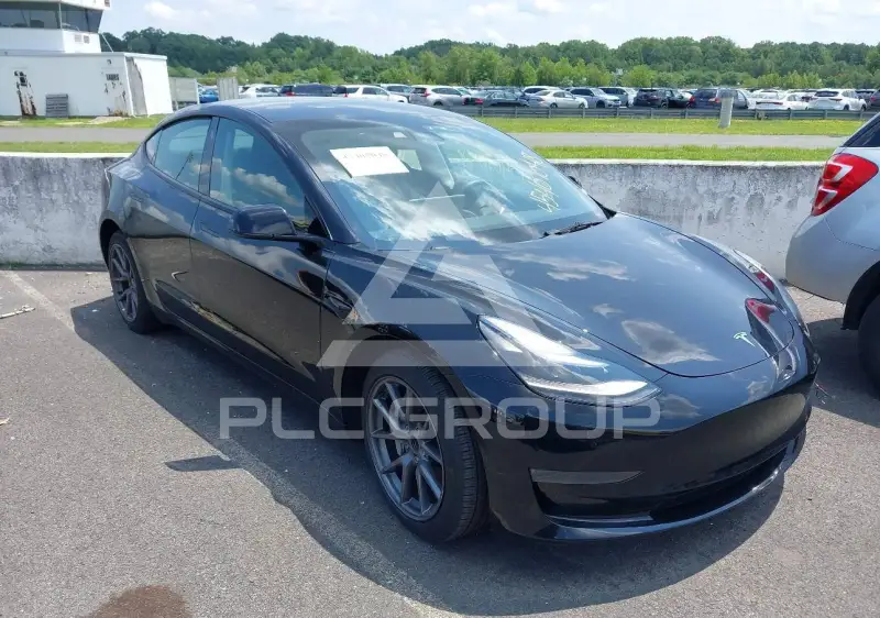 2023 Tesla Model 3 фото