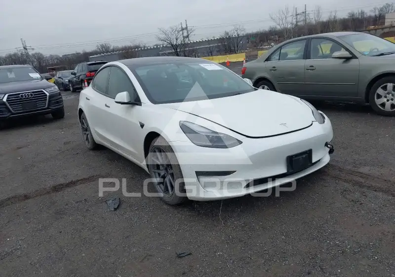 2023 Tesla Model 3 фото