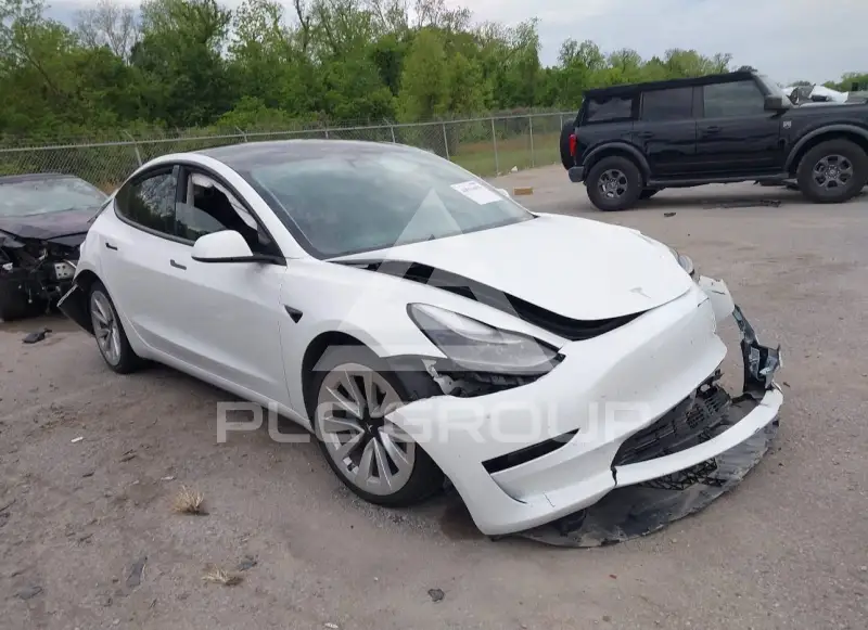 2023 Tesla Model 3 фото