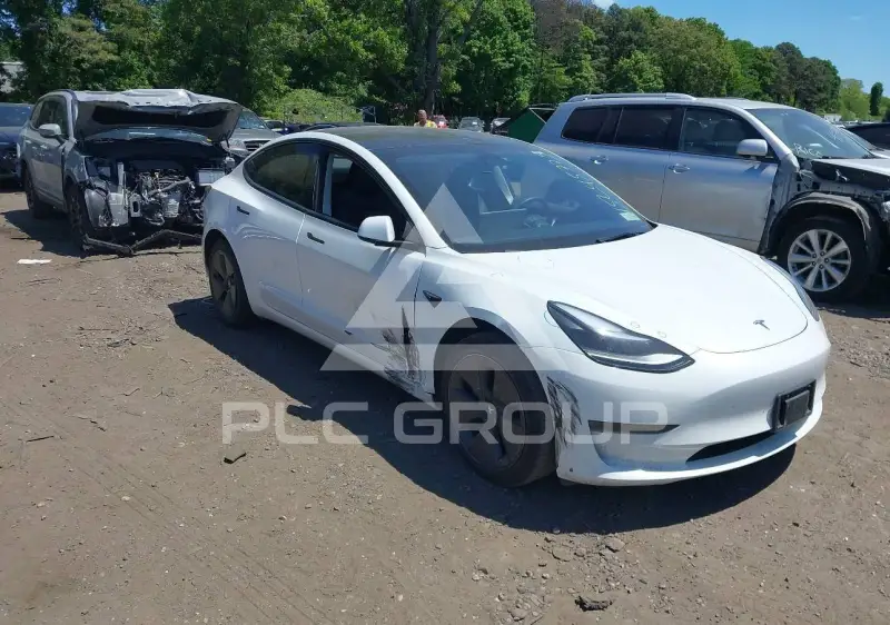 2023 Tesla Model 3 фото