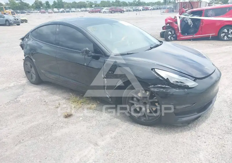 2023 Tesla Model 3 фото