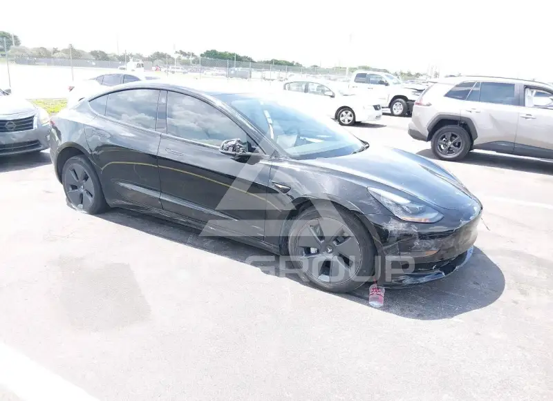 2023 Tesla Model 3 фото