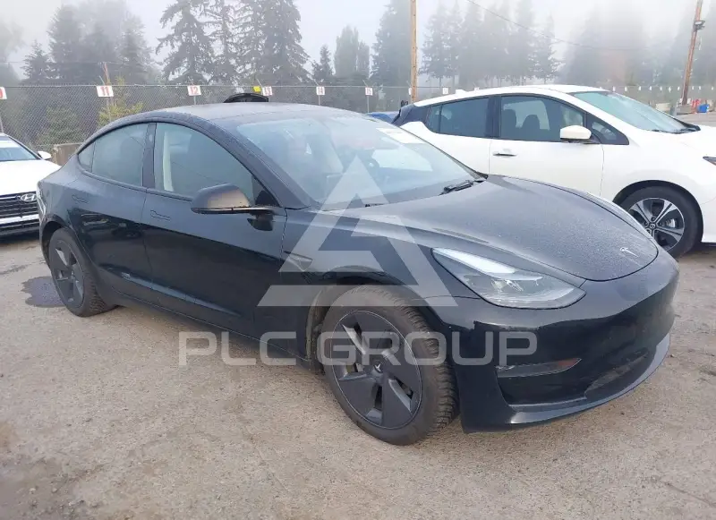 2023 Tesla Model 3 фото