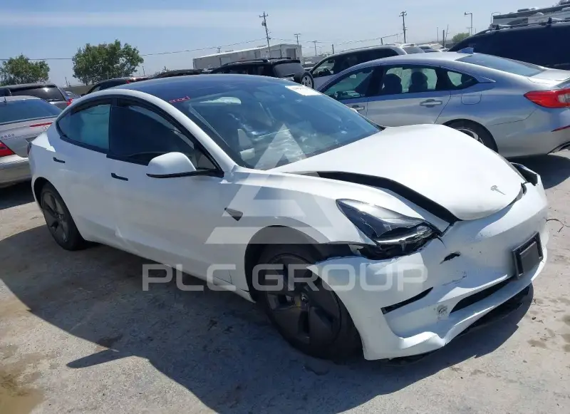 2023 Tesla Model 3 фото