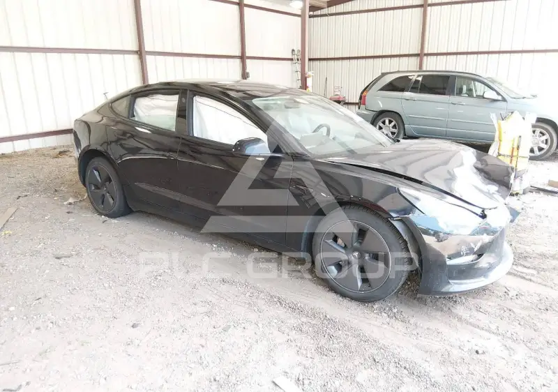 2023 Tesla Model 3 фото