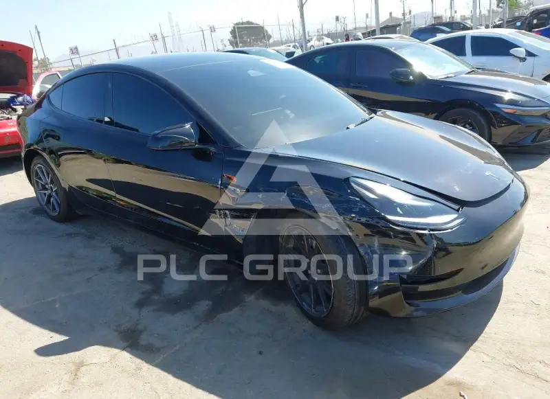 2023 Tesla Model 3 фото