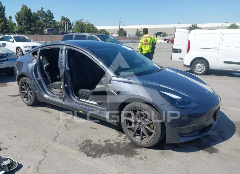 2023 Tesla Model 3 фото