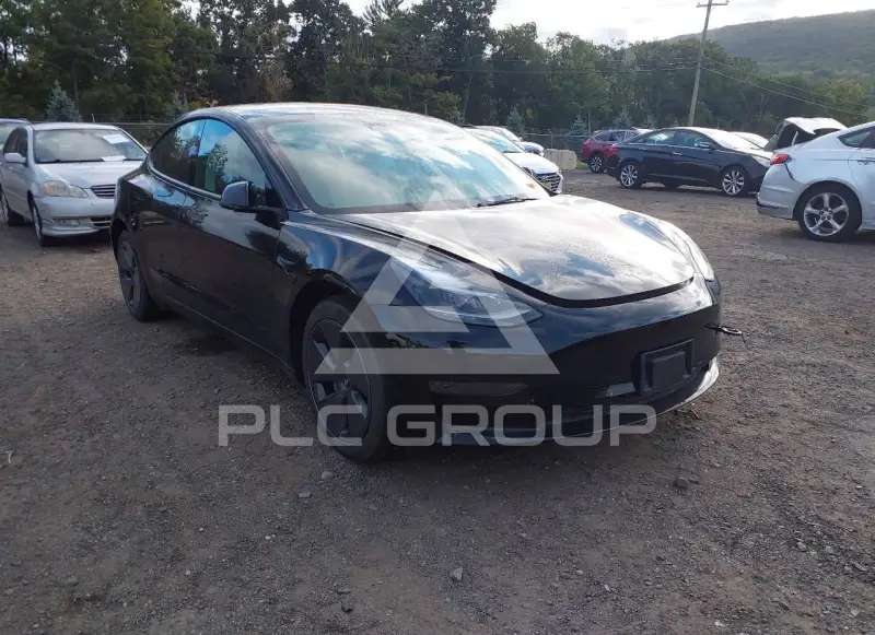 2023 Tesla Model 3 фото