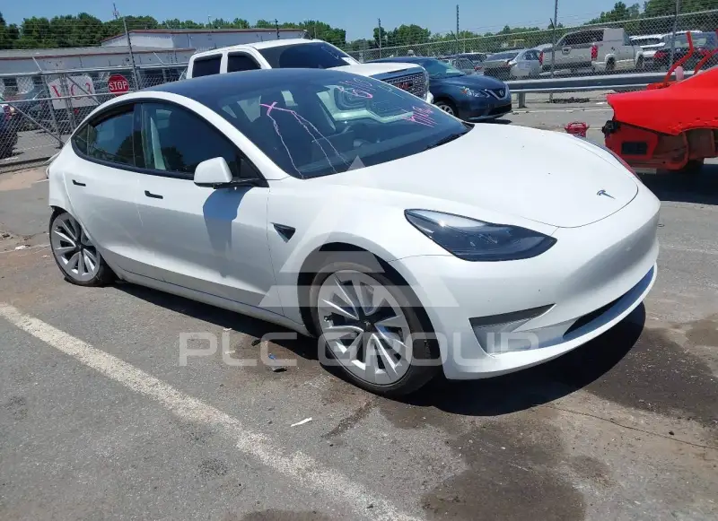 2023 Tesla Model 3 фото