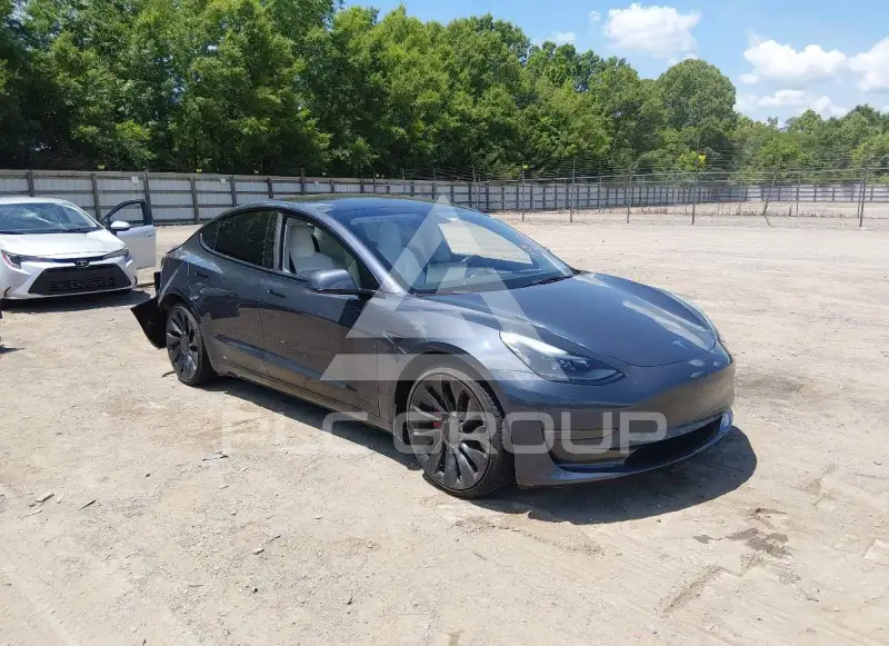 2023 Tesla Model 3 фото
