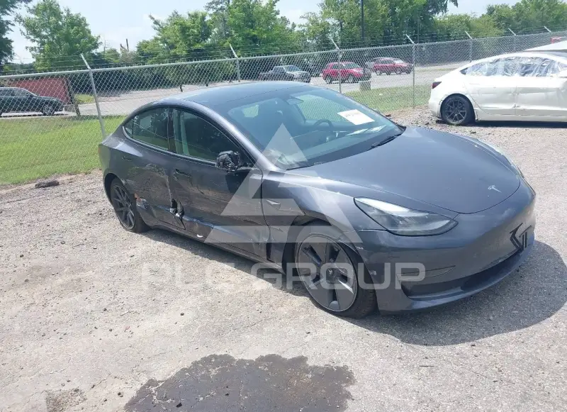 2023 Tesla Model 3 фото