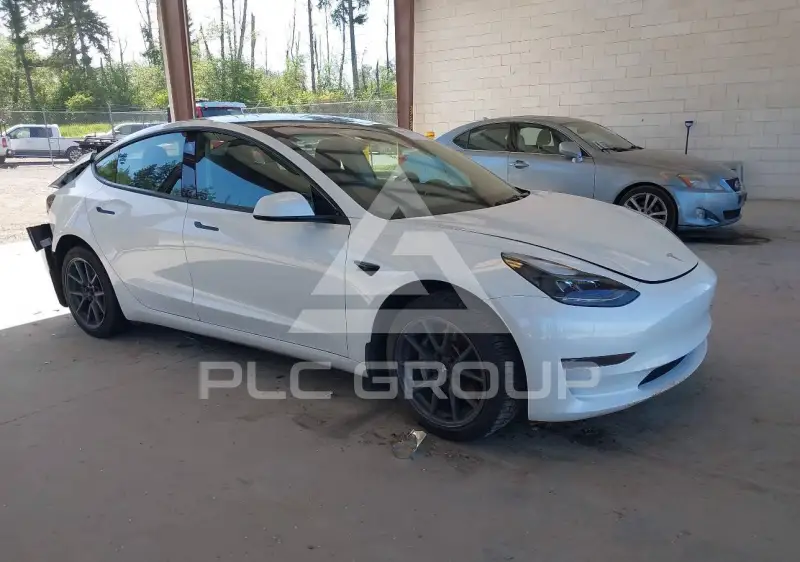 2023 Tesla Model 3 фото