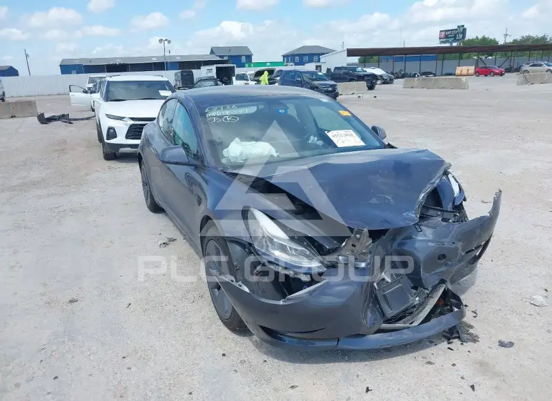 2023 Tesla Model 3 фото