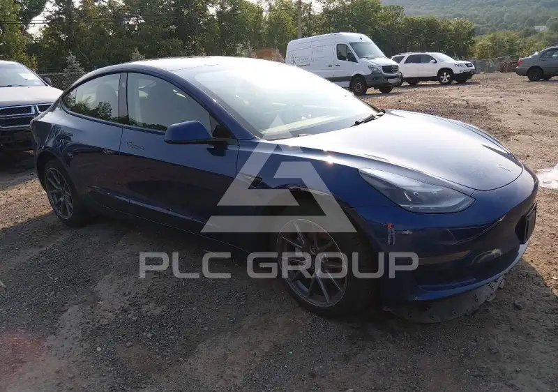 2023 Tesla Model 3 фото