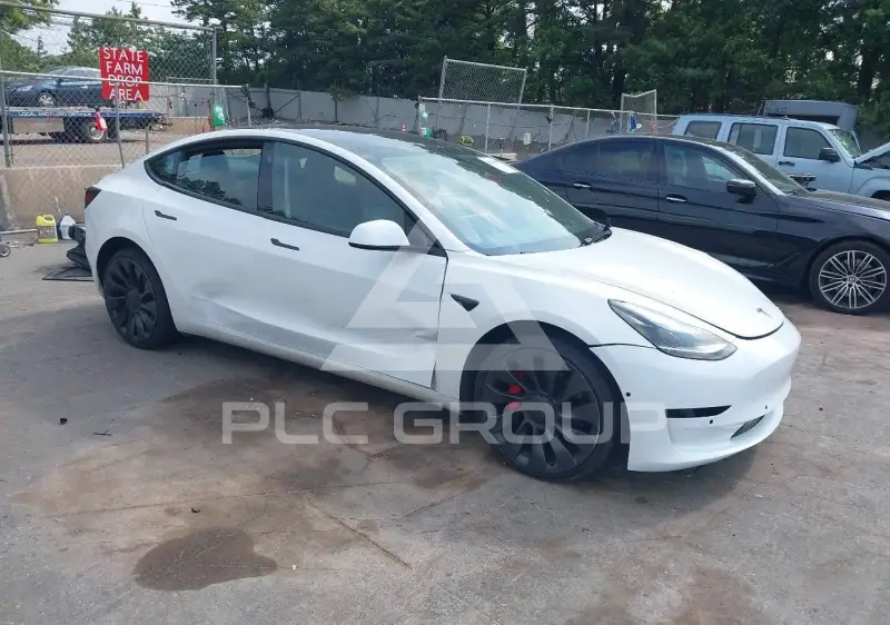 2023 Tesla Model 3 фото