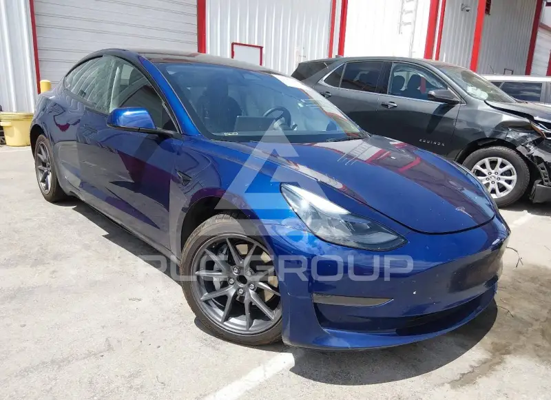 2023 Tesla Model 3 фото