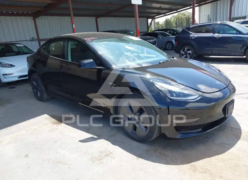 2023 Tesla Model 3 фото