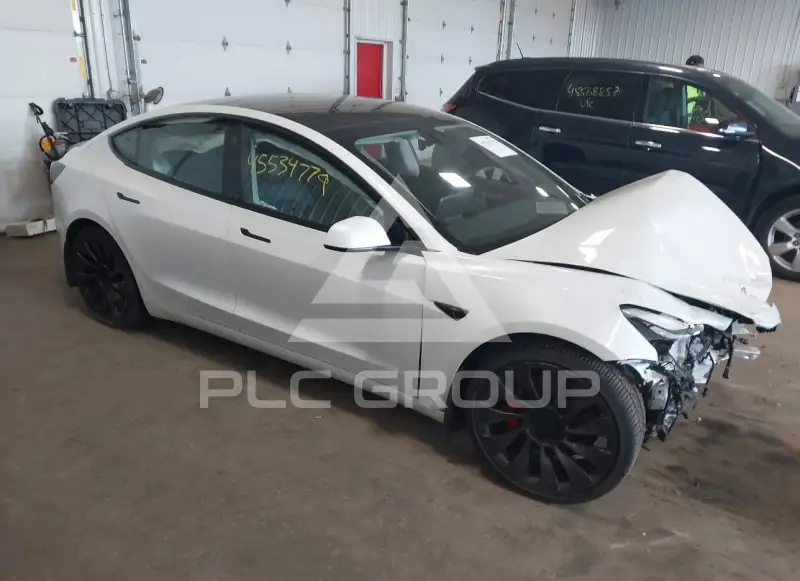 2023 Tesla Model 3 фото