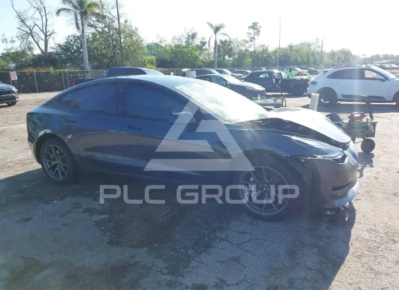 2023 Tesla Model 3 фото