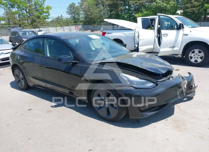 2023 Tesla Model 3 фото