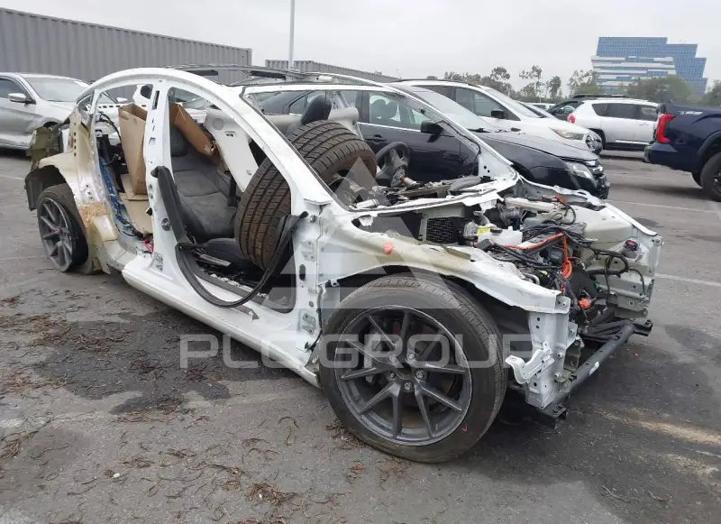 2023 Tesla Model 3 фото