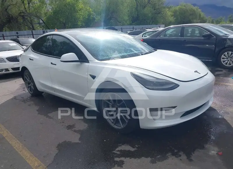 2023 Tesla Model 3 фото