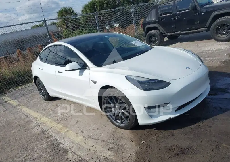 2023 Tesla Model 3 фото
