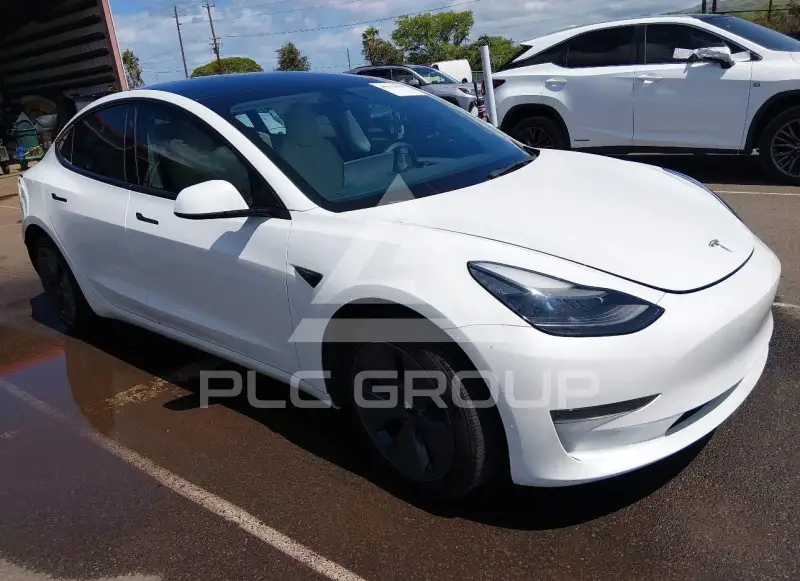 2023 Tesla Model 3 фото