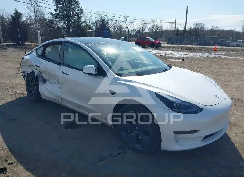 2023 Tesla Model 3 фото