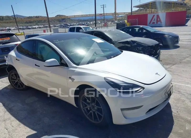 2023 Tesla Model 3 фото