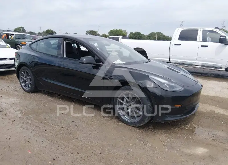 2023 Tesla Model 3 фото