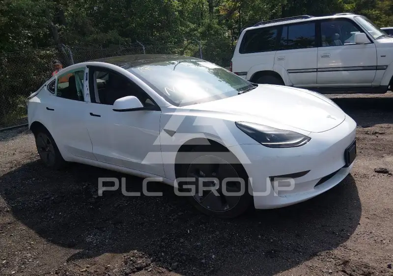 2023 Tesla Model 3 фото