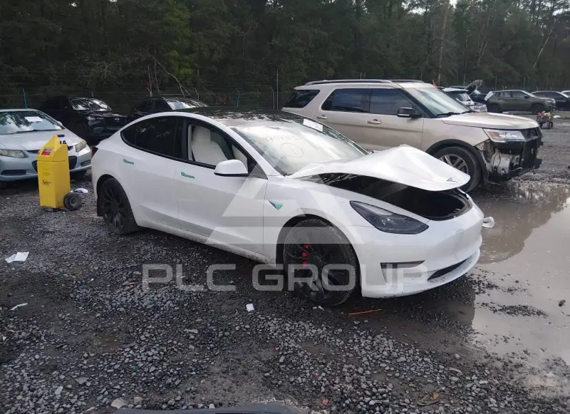 2023 Tesla Model 3 фото