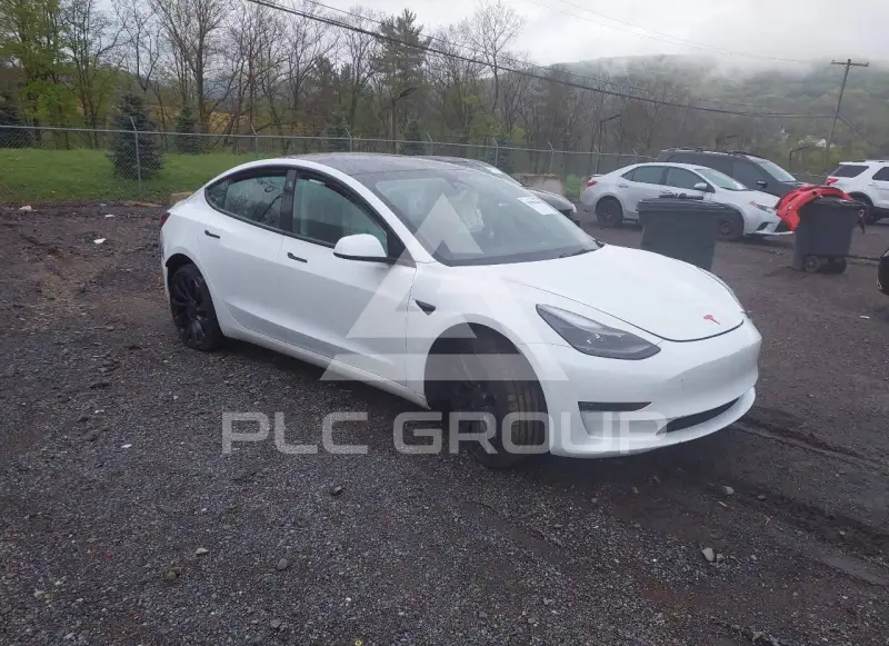 2023 Tesla Model 3 фото