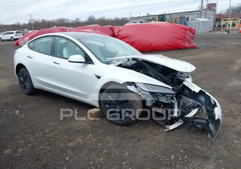 2025 Tesla Model 3 фото