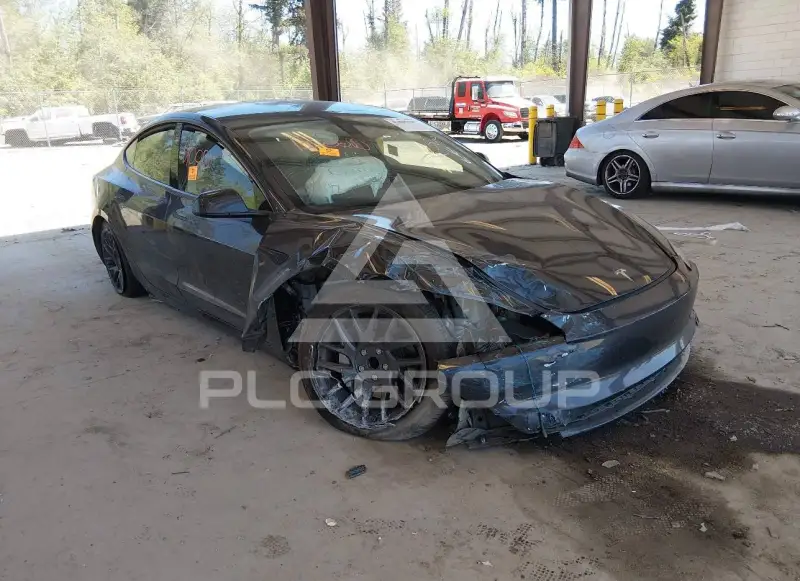 2025 Tesla Model 3 фото