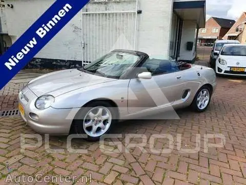 1998 MG 