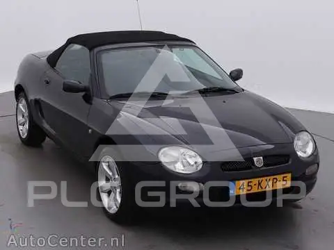 2002 MG 
