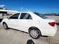 2003 Toyota COROLLA фото