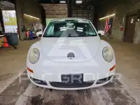 2010 Volkswagen BEETLE фото