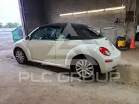 2010 Volkswagen BEETLE фото