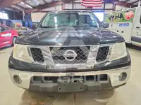 2011 Nissan FRONTIER фото