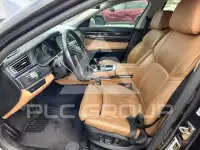 2011 BMW 740 фото