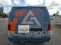 2011 Ford E-150 фото