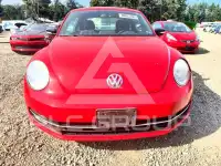 2012 Volkswagen BEETLE фото