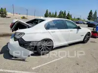 2013 BMW 740 фото