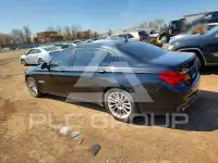 2014 BMW 740 фото