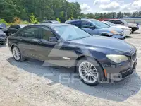 2014 BMW 750 фото